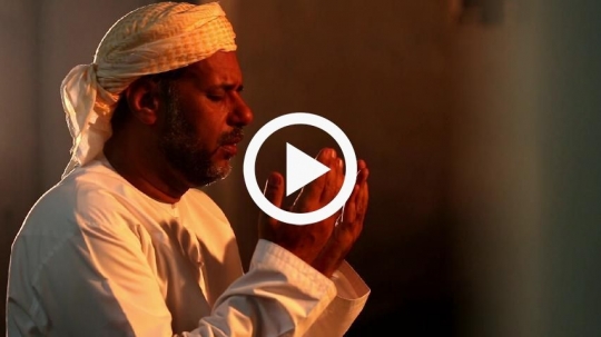 man focusing and praying