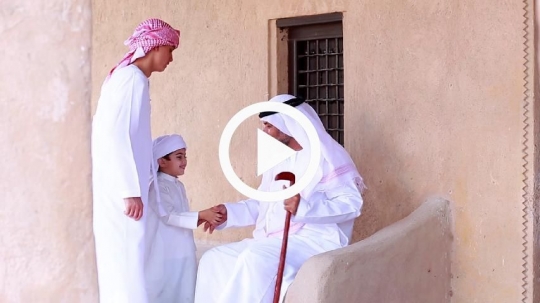 Kids greeting grandfather