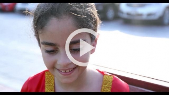 Close up of an Arab girl representing her country|