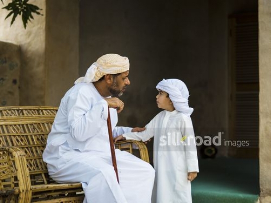 Old man spending time with little boy|-