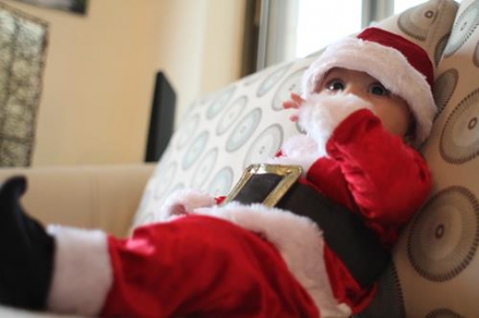 -Baby Dressed as Santa Claus