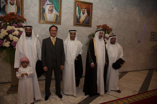 arab men with kids at a ceremony