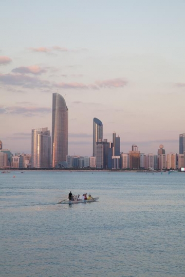 city view with a boat in the sea