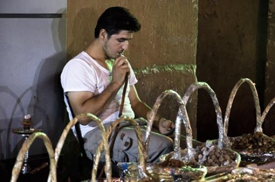 street vendor smoking narghile