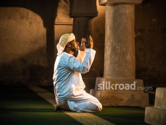 Old man praying at THE MOQUE|-