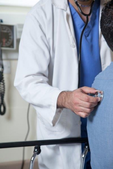 Doctor Checking out Patient