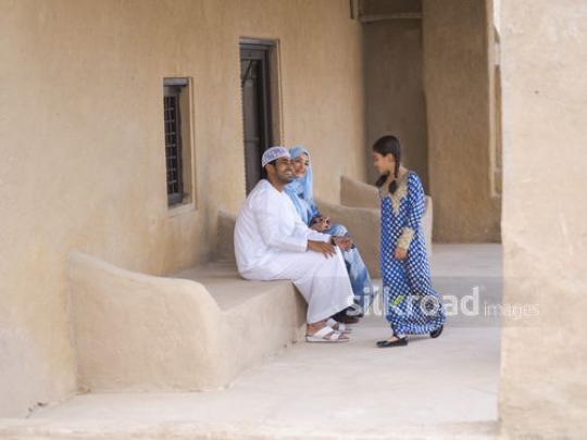 Girl arriving towards parents|-