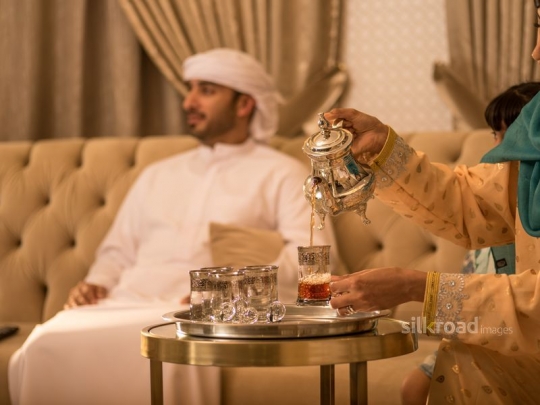 Wife serving tea|-