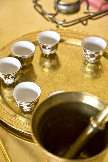 brass trey with cups and coffee grinder