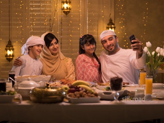 Arabic family taking selfie|-