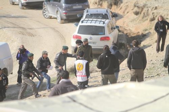 Palestinian demonstrators and policemen at Bab al-Shams or Gate of the Sun in Arabic.
