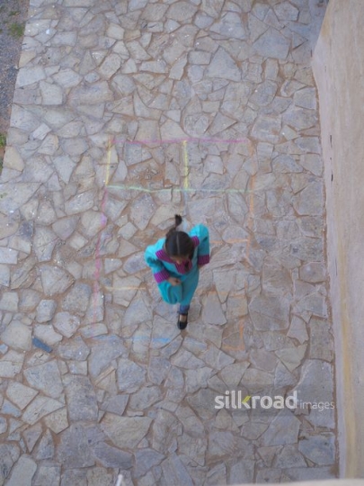 Girl playing and jumping|-