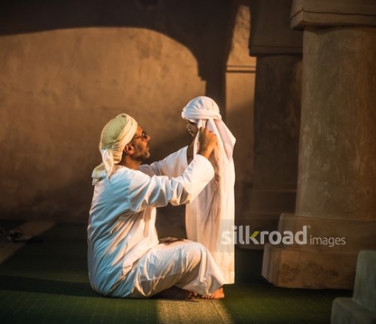 Old man with grandson at the mosque|-