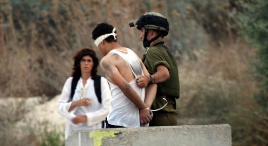 Israeli soldier arresting Pale
