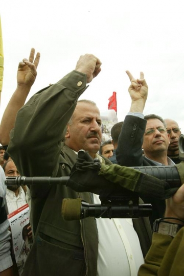 men protester showing peace sign