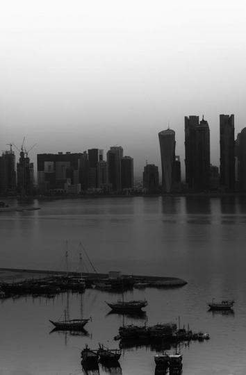 view of the city of doha,the capital city of Qatar in black and white