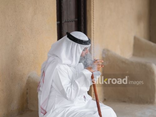 Old man smoking pipe|-