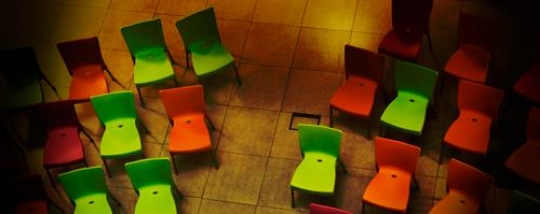 set of green and orange chairs