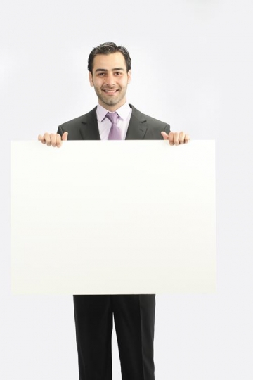 business man holding panel