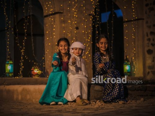 Kids playing with sparkling matches|-