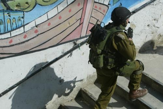 israeli soldier climbing stair