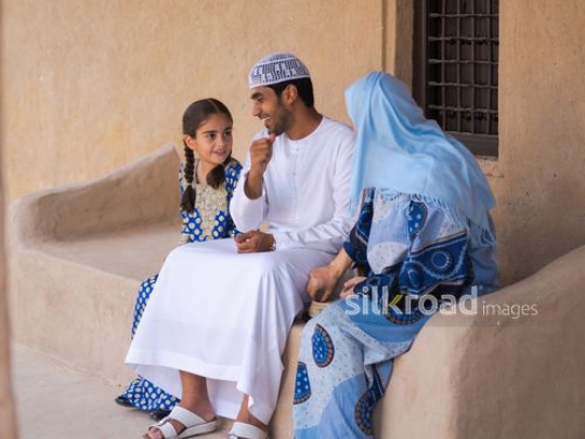 Family taking a break outside|-