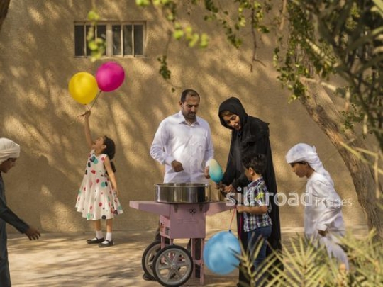 Middle Eastern people celebrating Eid|-