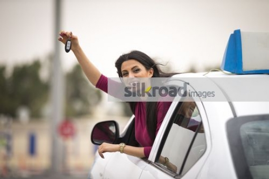 Young Arab Girl passed her driving test|