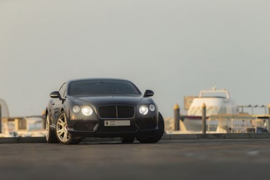 Black colored vehicle parked|-