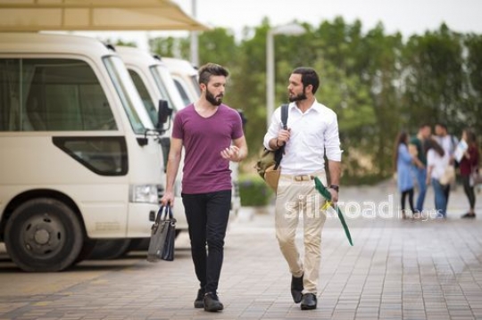 University students walking together on campus|-
