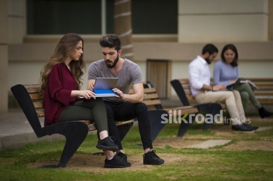 University Students sitting on the bench|-