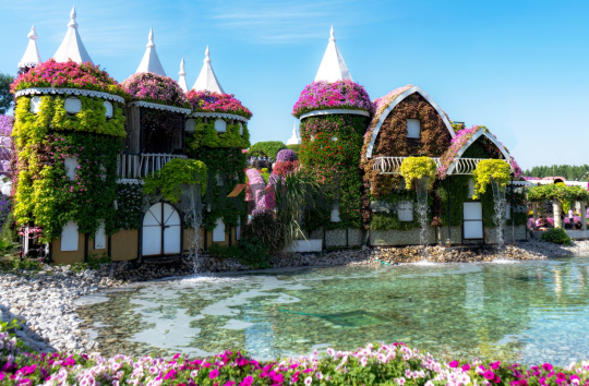 Beautiful Floral Houses by the Water at Dubai Miracle Garden