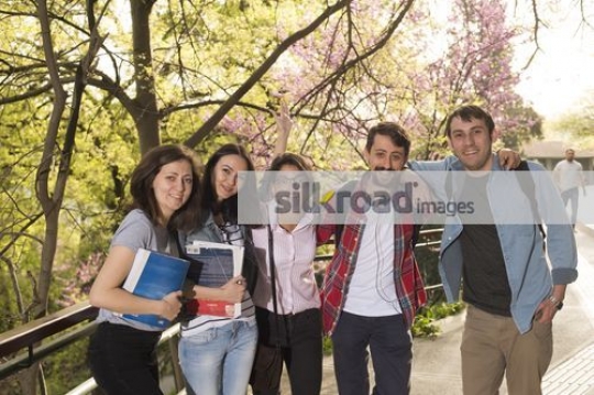 Group of friends smiling at the camera|