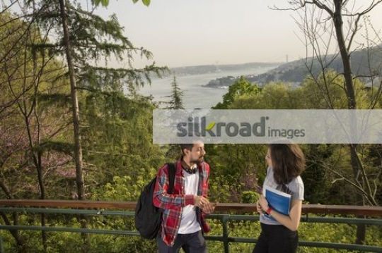 Two people talking to each other|