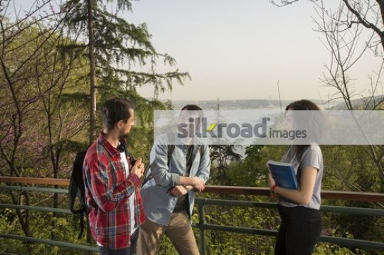 Group of friends talking to each other|