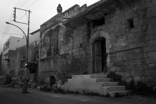 - Men at Jabal al-Qala in Al-Salt