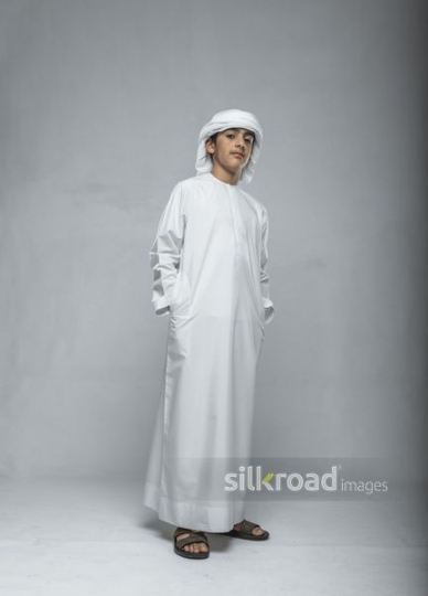 Arabian boy pausing
