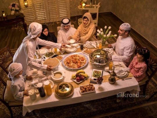 Family eating iftar|-