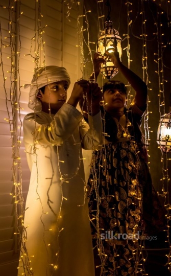 brother and sister fixing lights|-