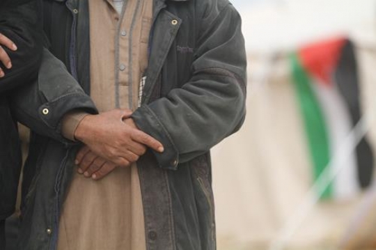 Palestinian demonstrators praying at Bab al-Shams or Gate of the Sun