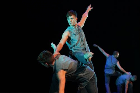 Young men dancing