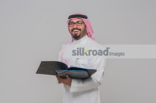 Man standing with folder in his hand|