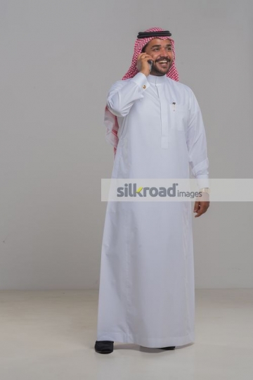 Middle Eastern Businessman on a phone call|