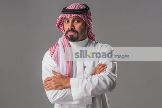 Middle Eastern Businessman arms crossed