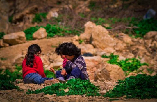 View of the town of Salt in Jordan, girls playing.