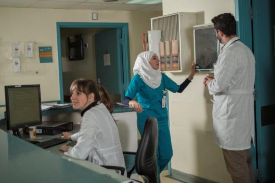 Doctor and Nurse Checking X-Ray Results