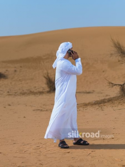 Man talking over mobile phone