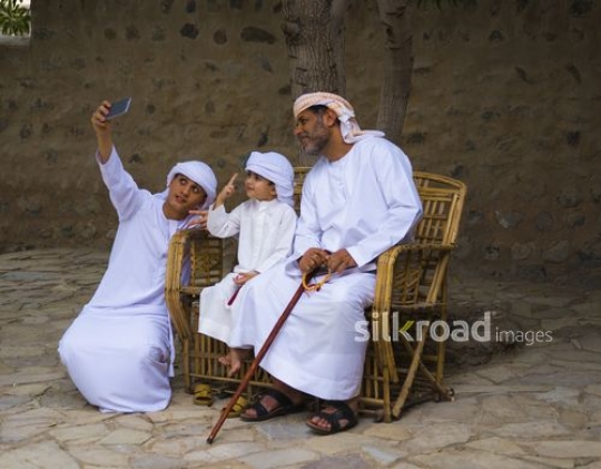 Family taking selfie|-