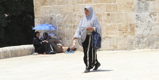 Woman in the yard Aqsa