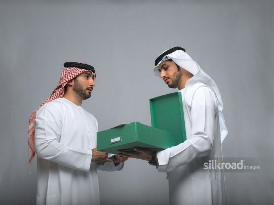 Colleagues opening boxes